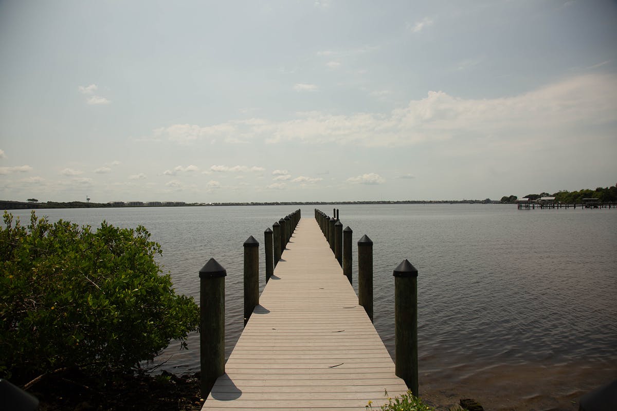 a long dock on the river