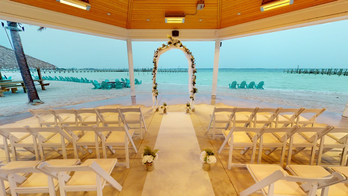 indoor wedding reception facing the beach