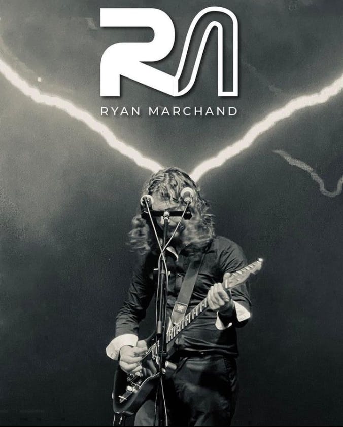 ryan marchand playing guitar