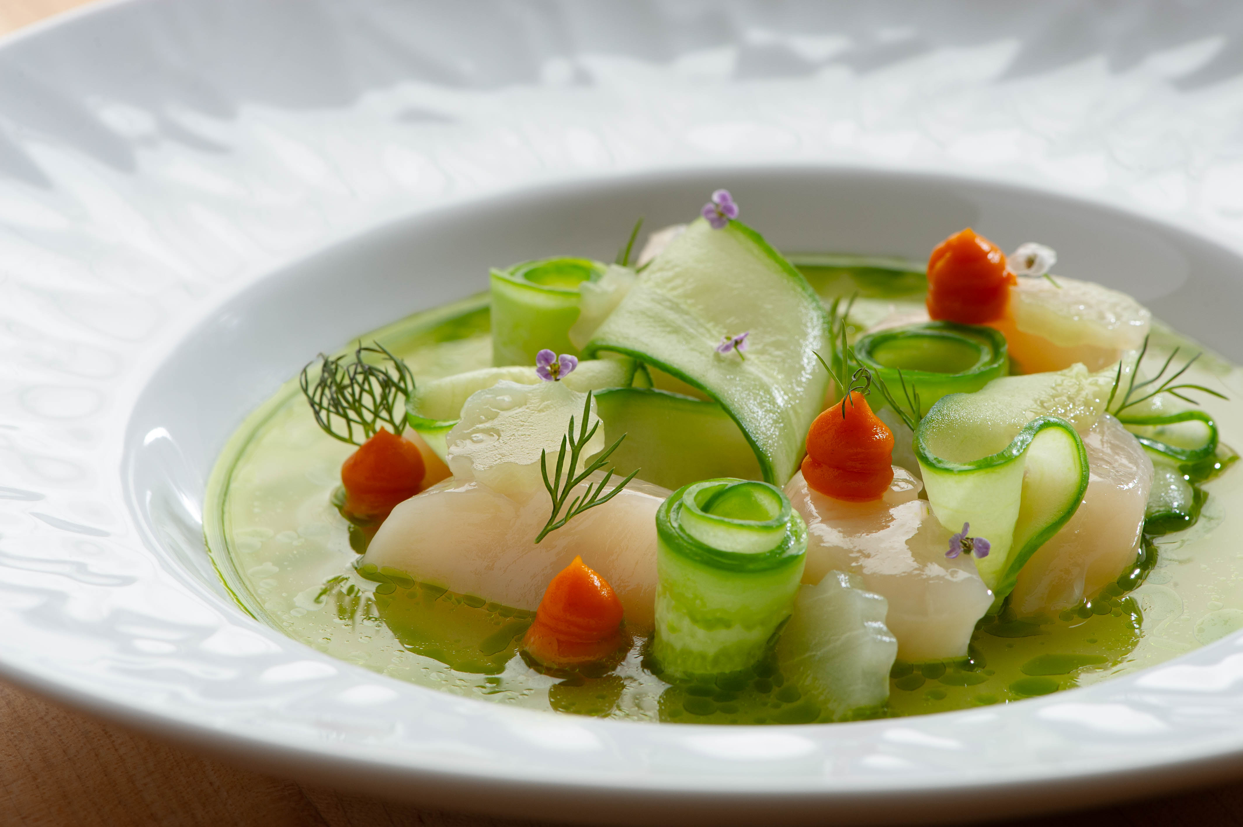 a bowl of soup with vegetables