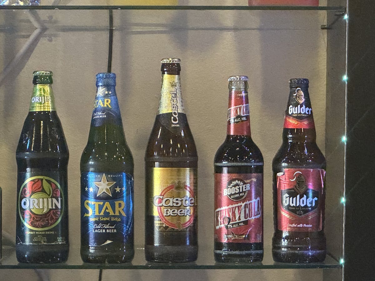 an empty bottle of beer