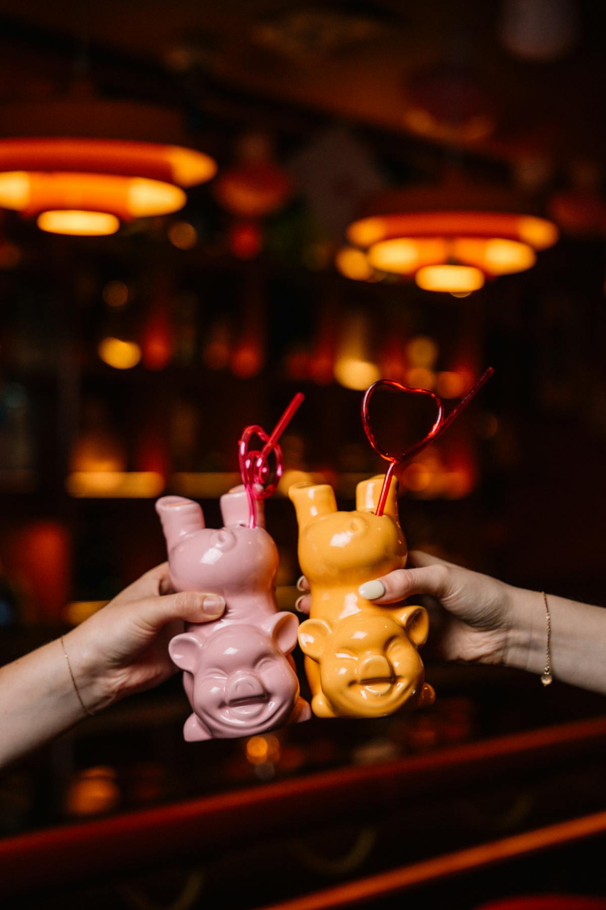 a hand holding a glass of wine