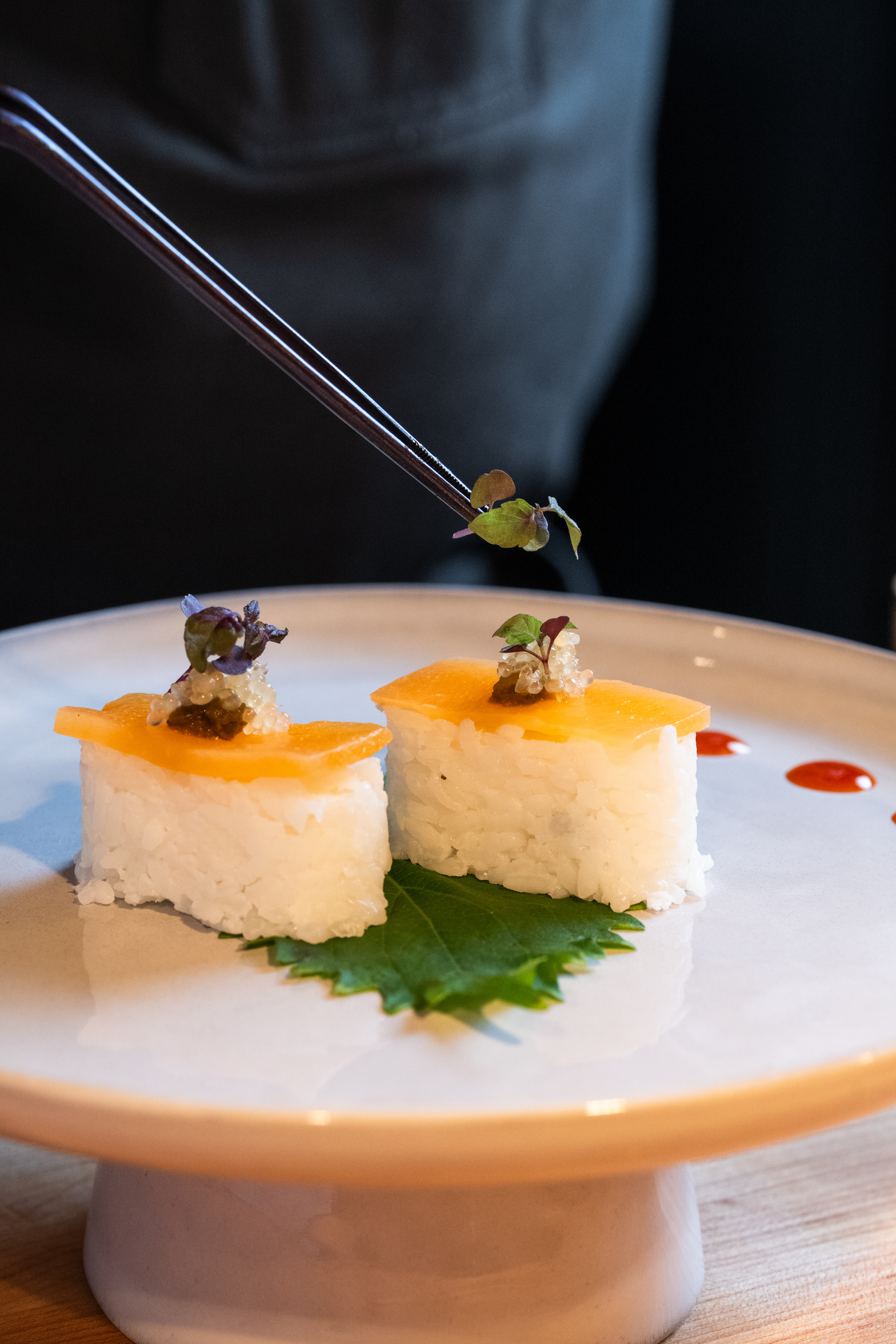 a plate of food and a cup of coffee