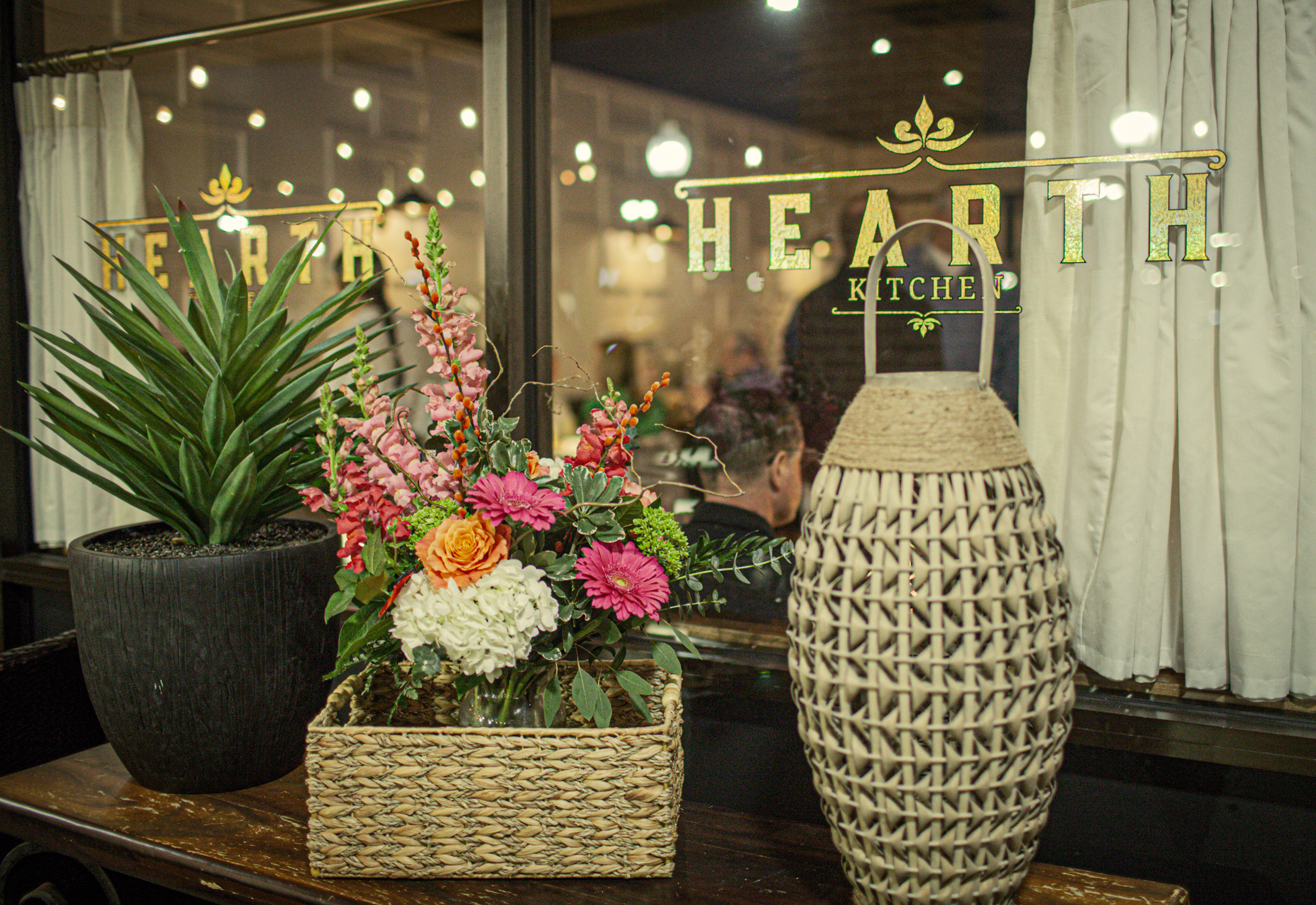 a vase of flowers on a table