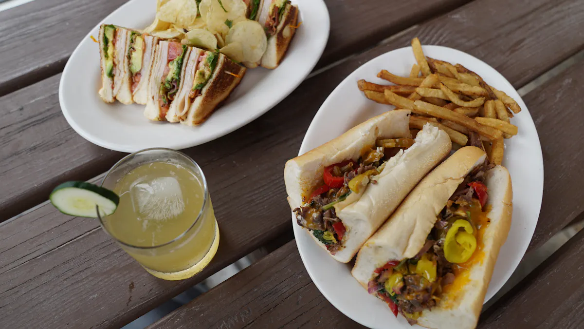 a plate of food with a sandwich and french fries on a table