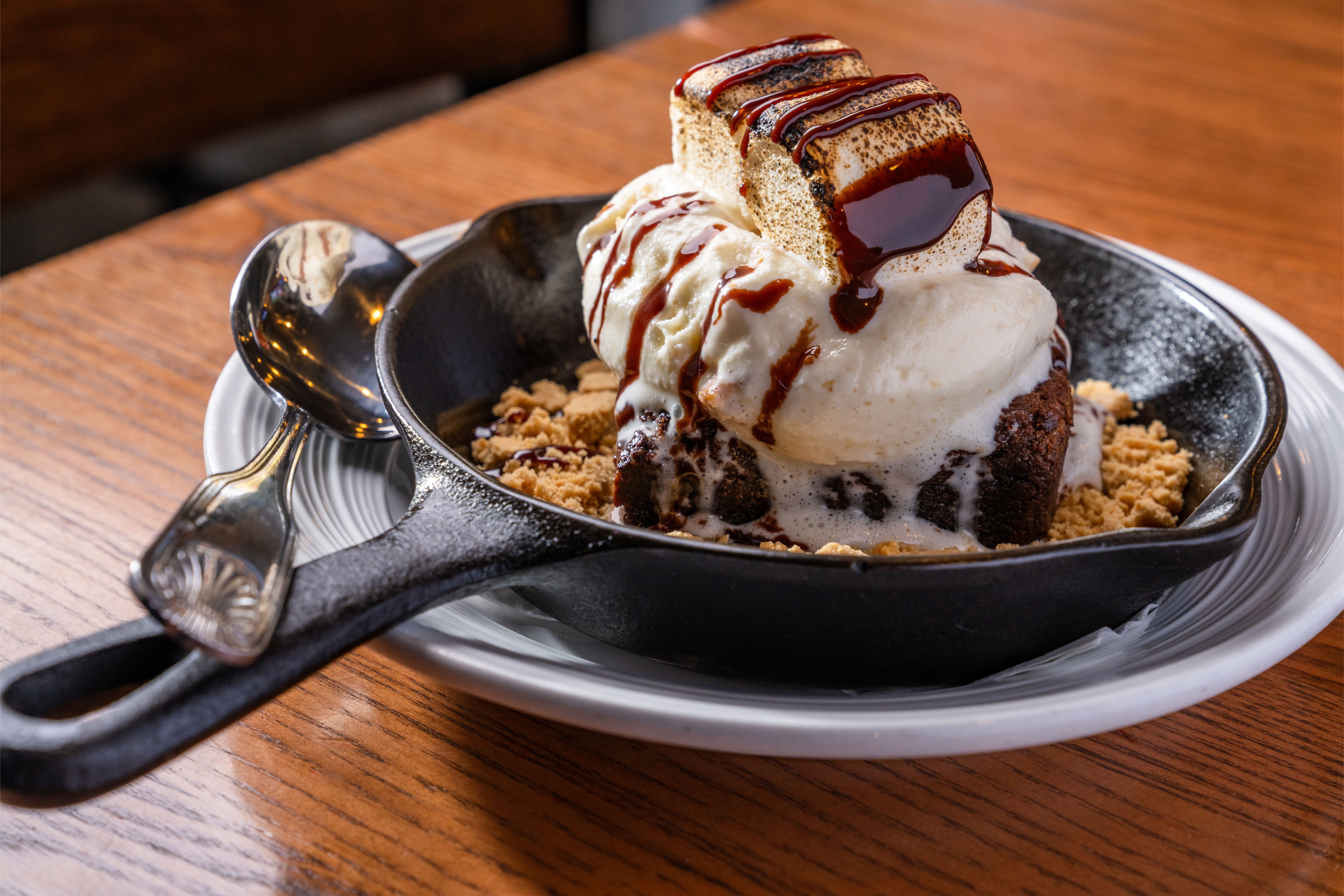 a piece of cake sitting on top of a wooden table