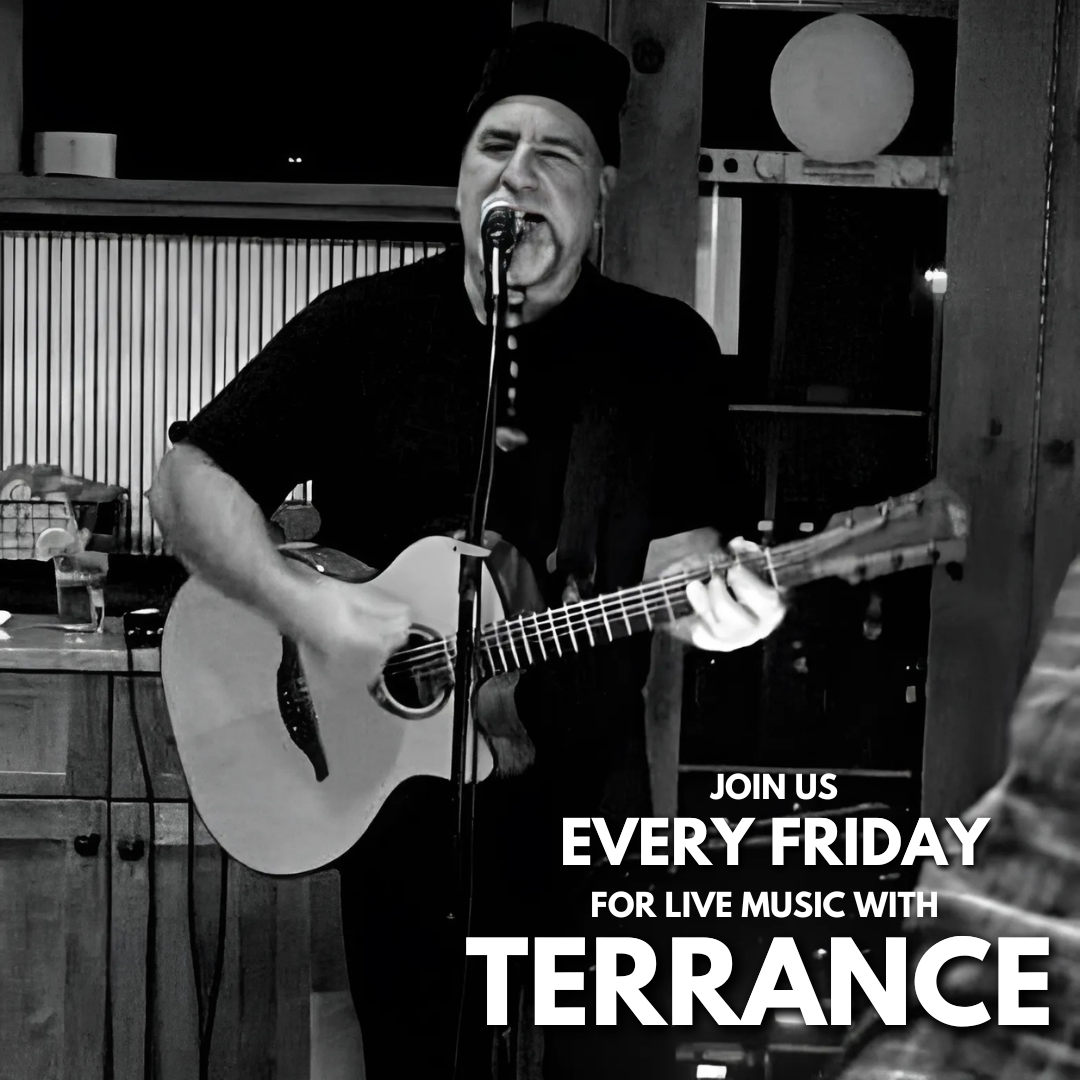 a man holding a guitar