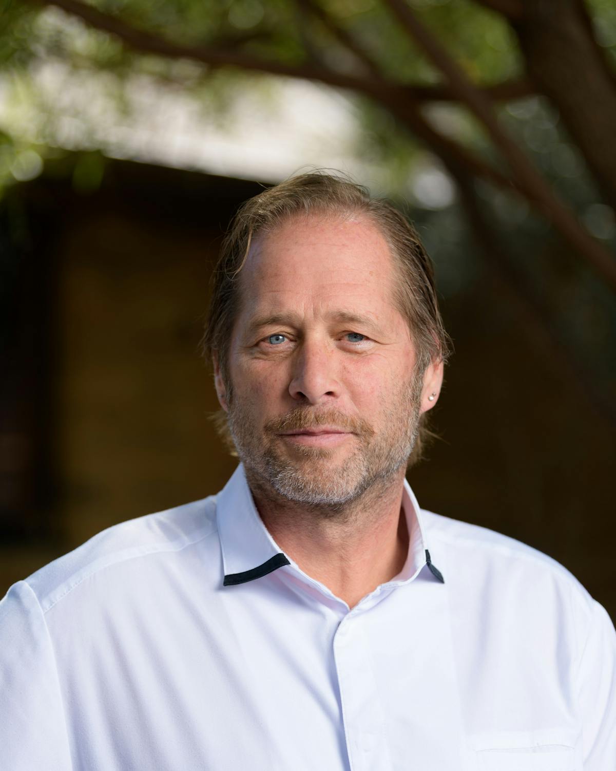 David Kinch wearing a white shirt