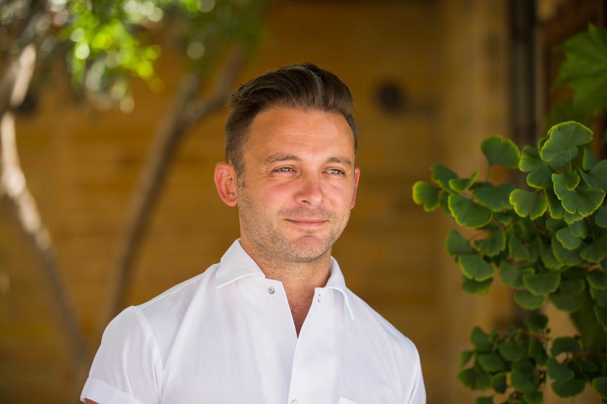 a man wearing a white shirt