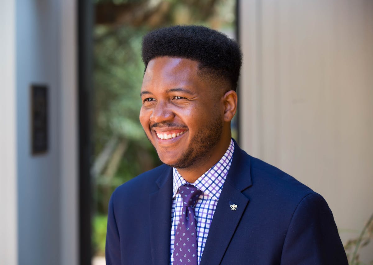 a man wearing a suit and tie