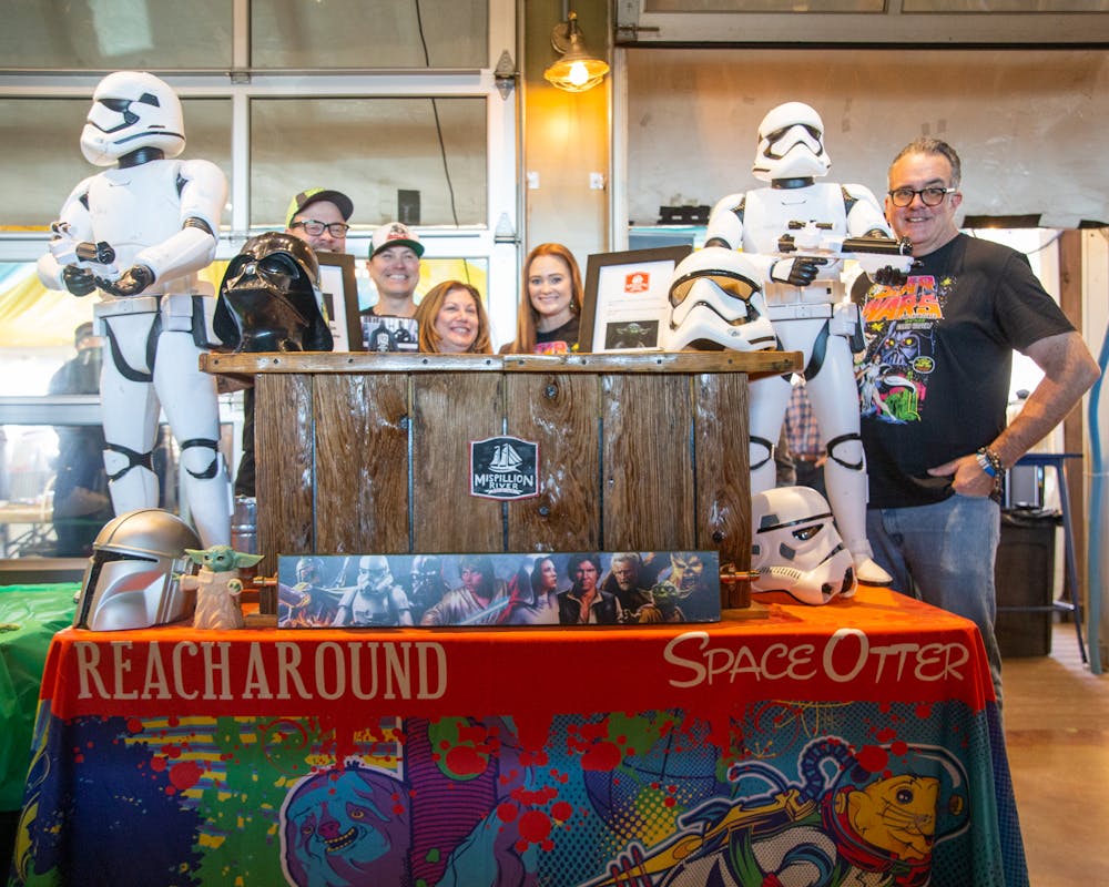 a group of people standing in a room