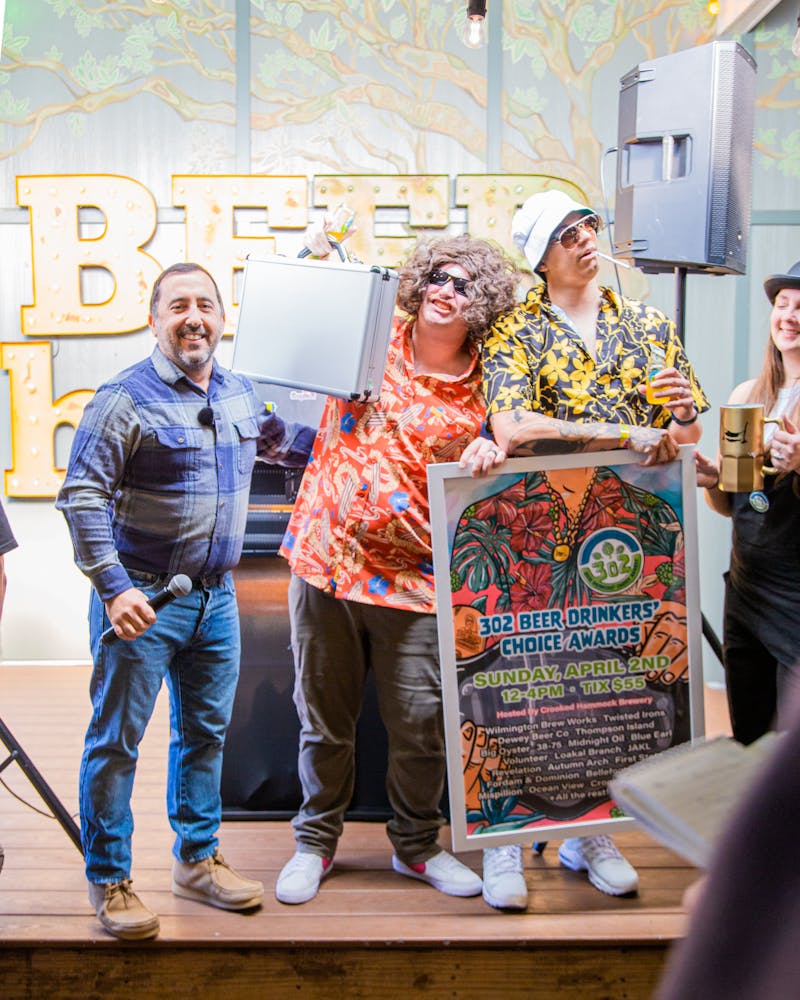 a group of people standing in a room