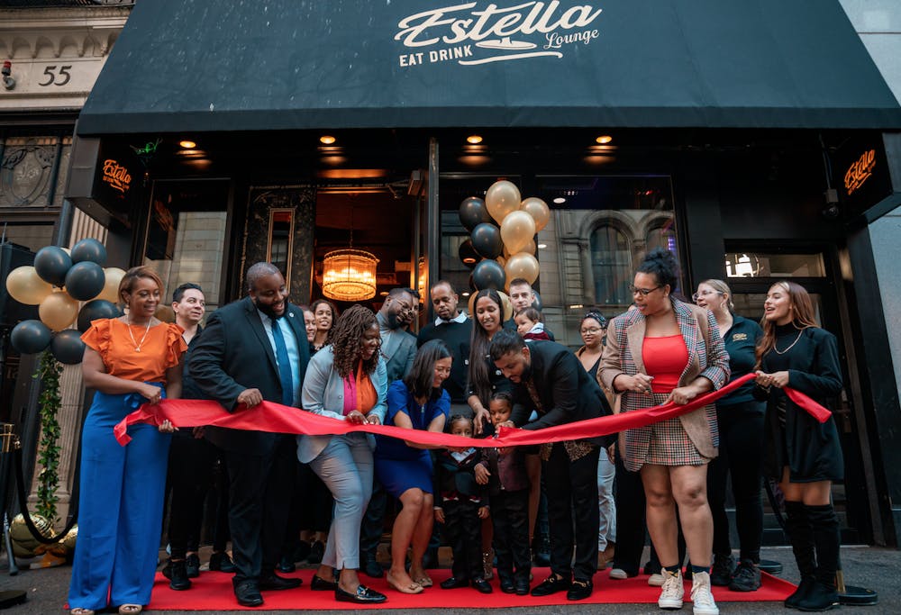 a group of people standing in front of a crowd