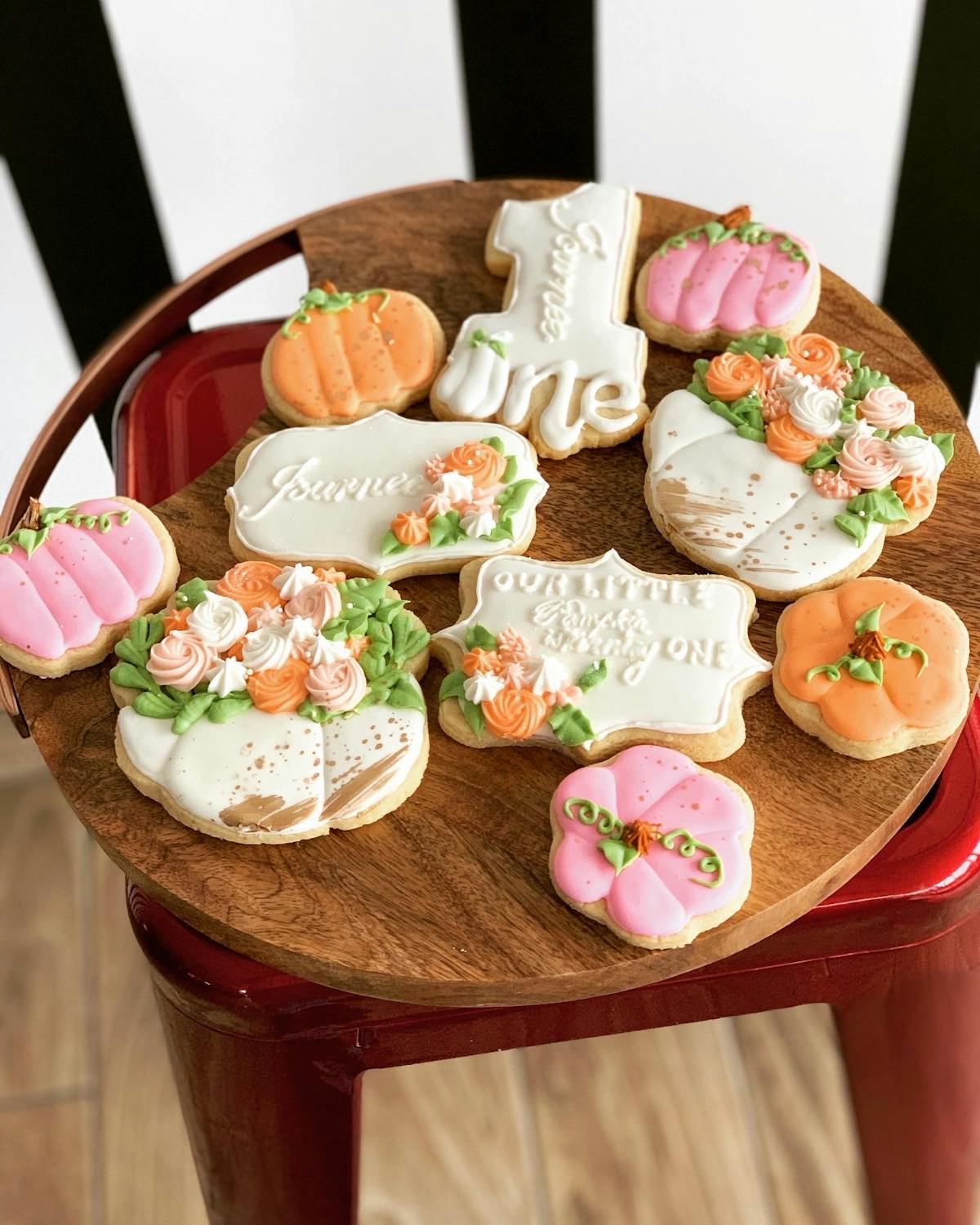 a plate of cookies sitting on top of a wooden table
