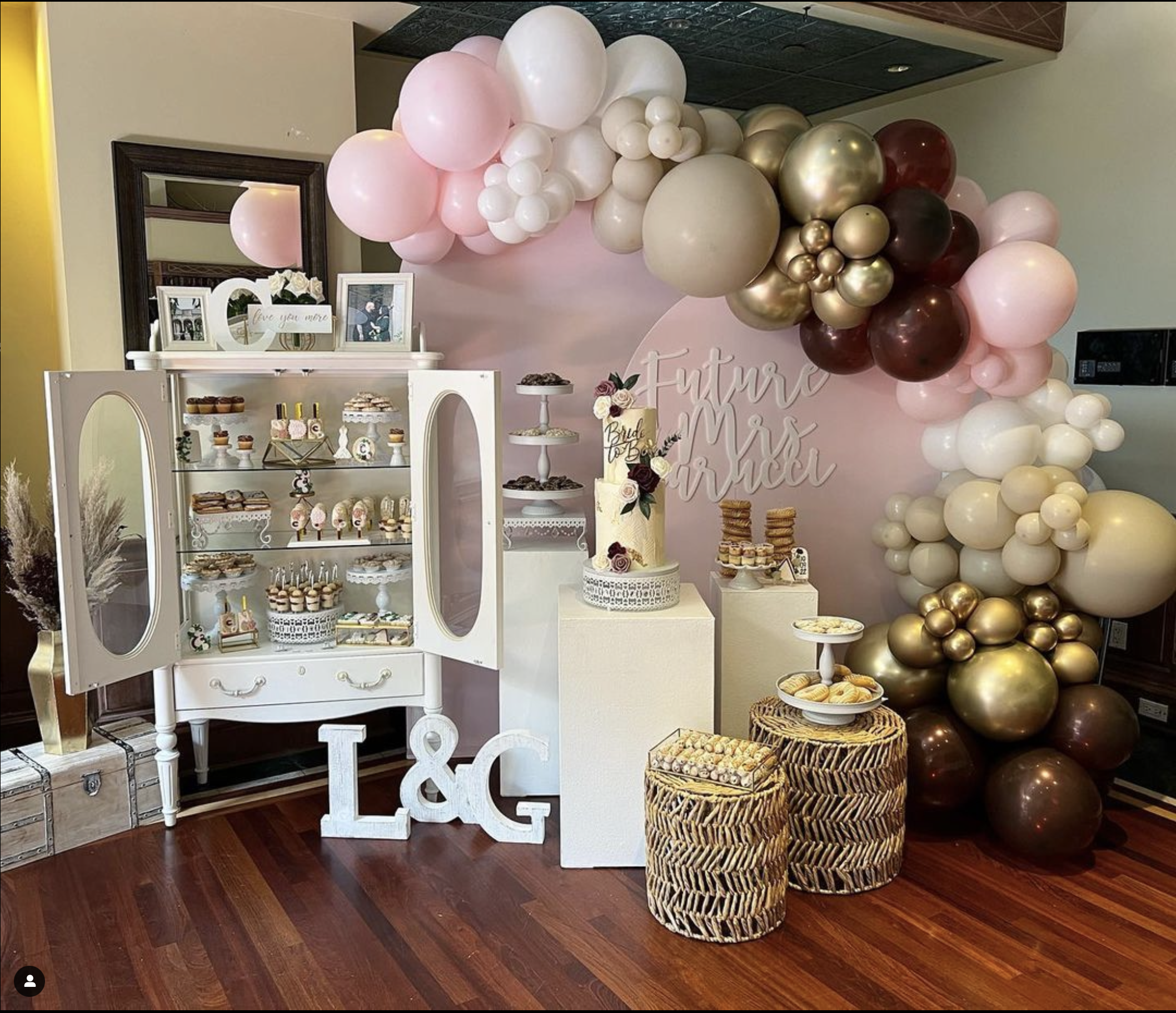 a table with food and balloons