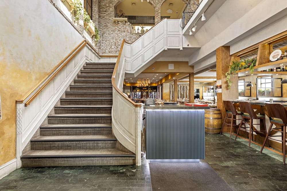 a chair sitting in front of a building