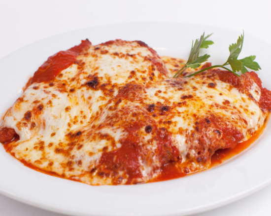a plate of food on a white surface