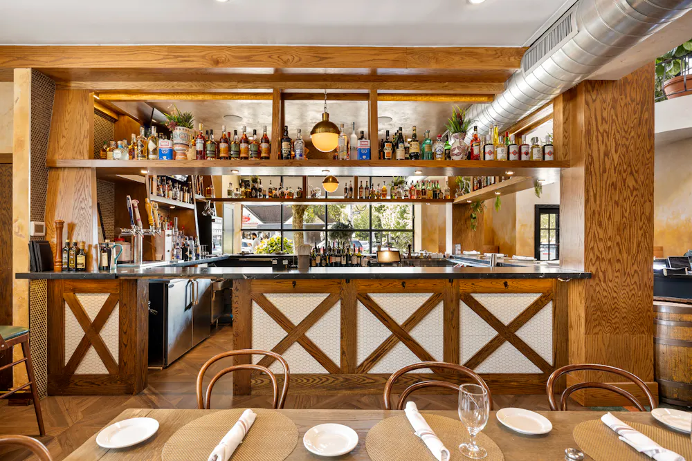 a kitchen with a dining table