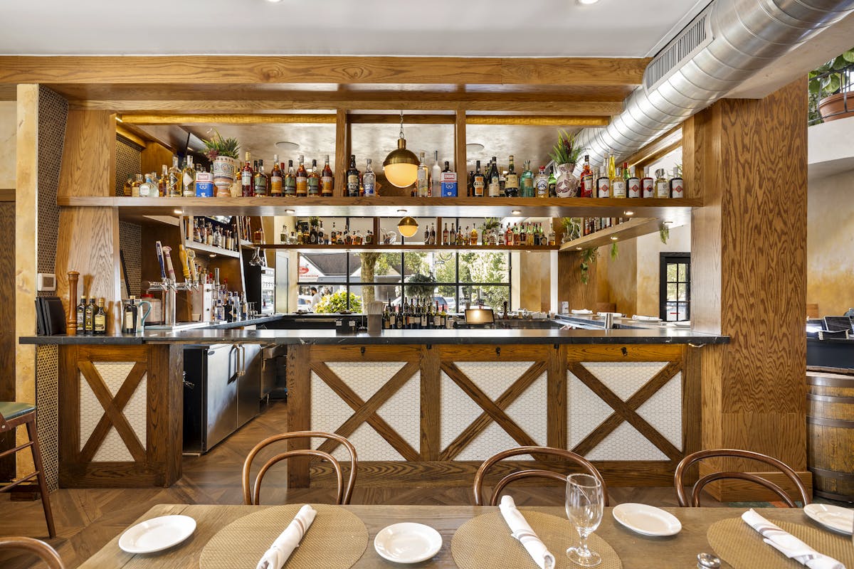 a kitchen with a dining table