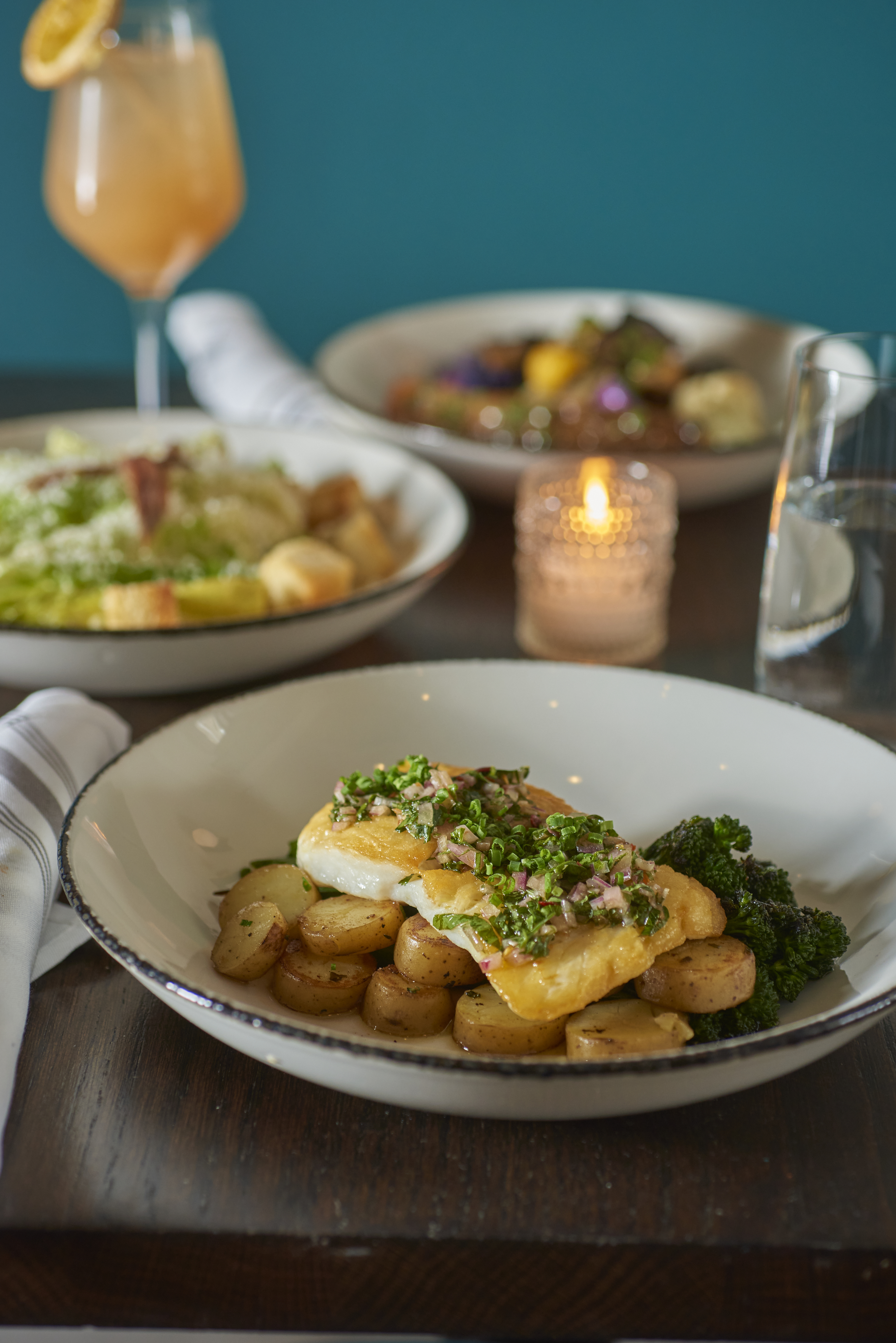 a bowl of food on a plate on a table