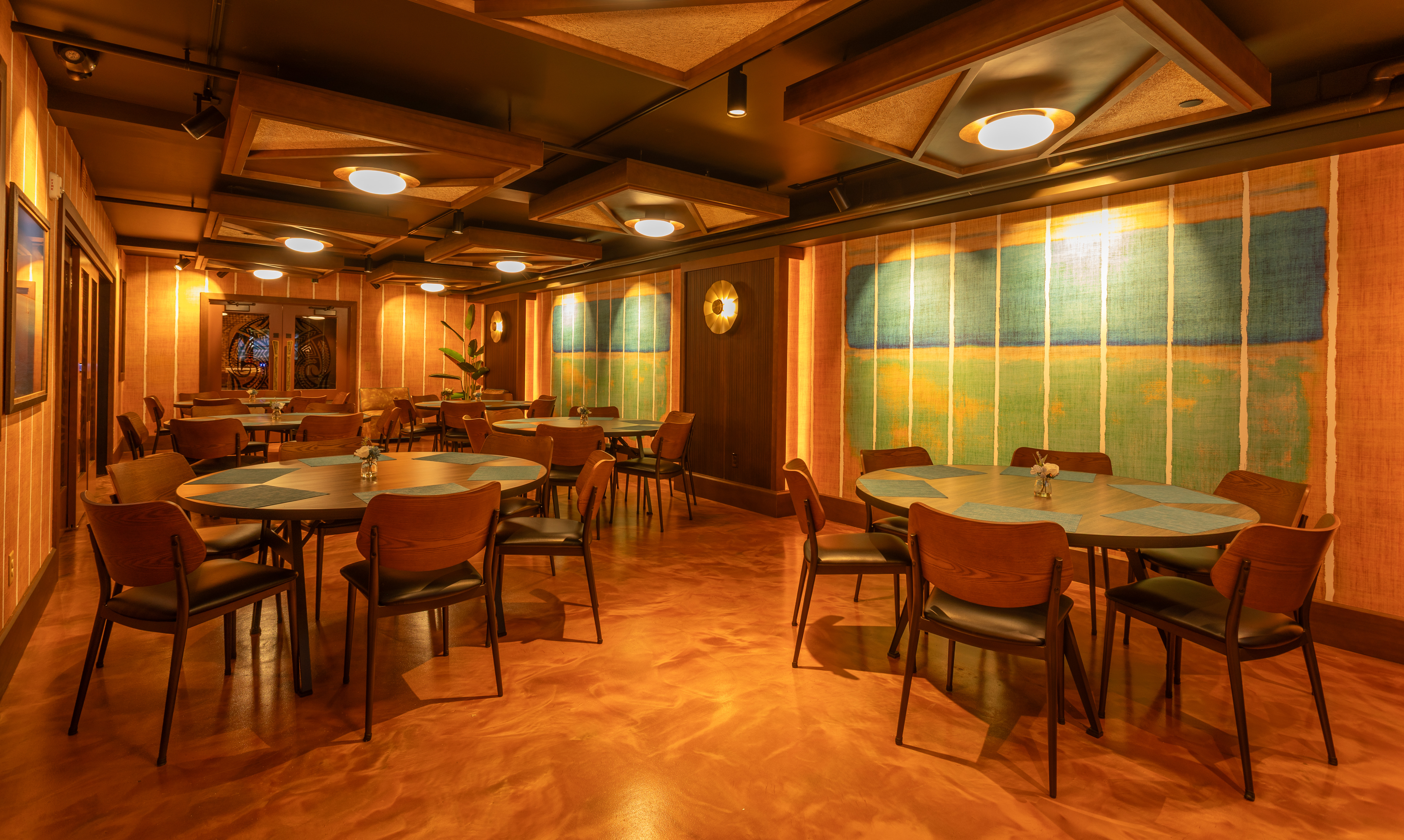 a room with tables and chairs