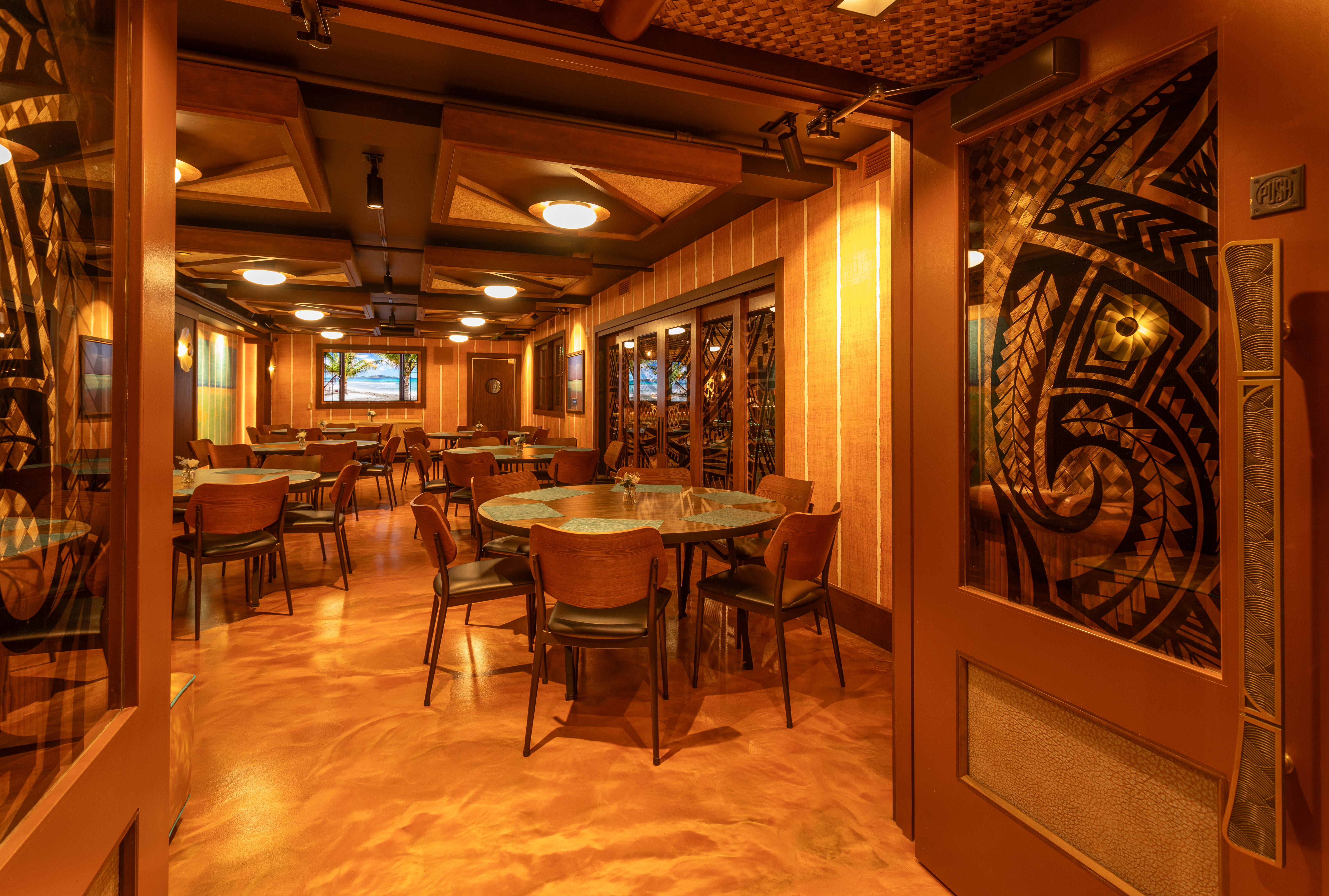 a room with tables and chairs