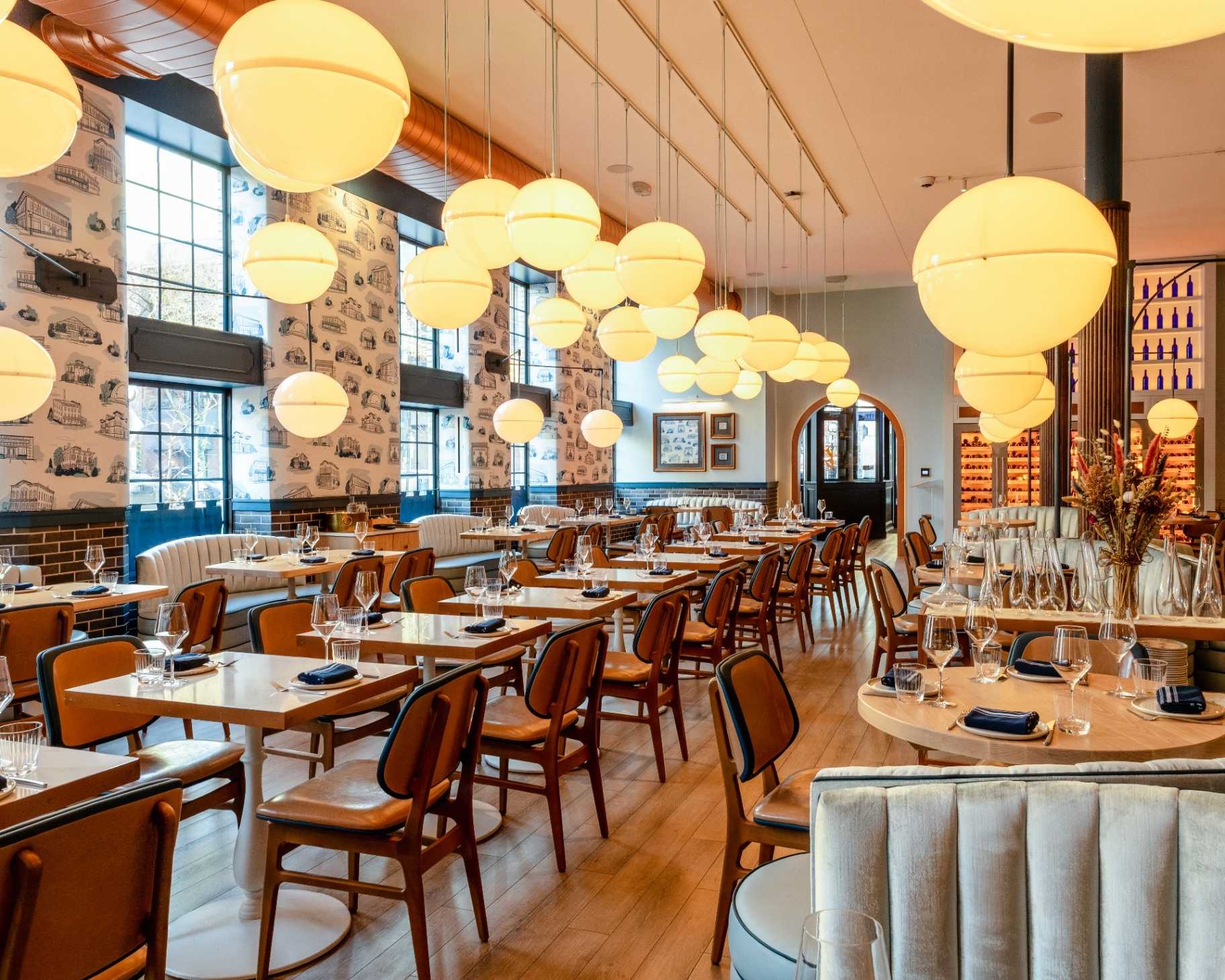 a restaurant with tables and chairs