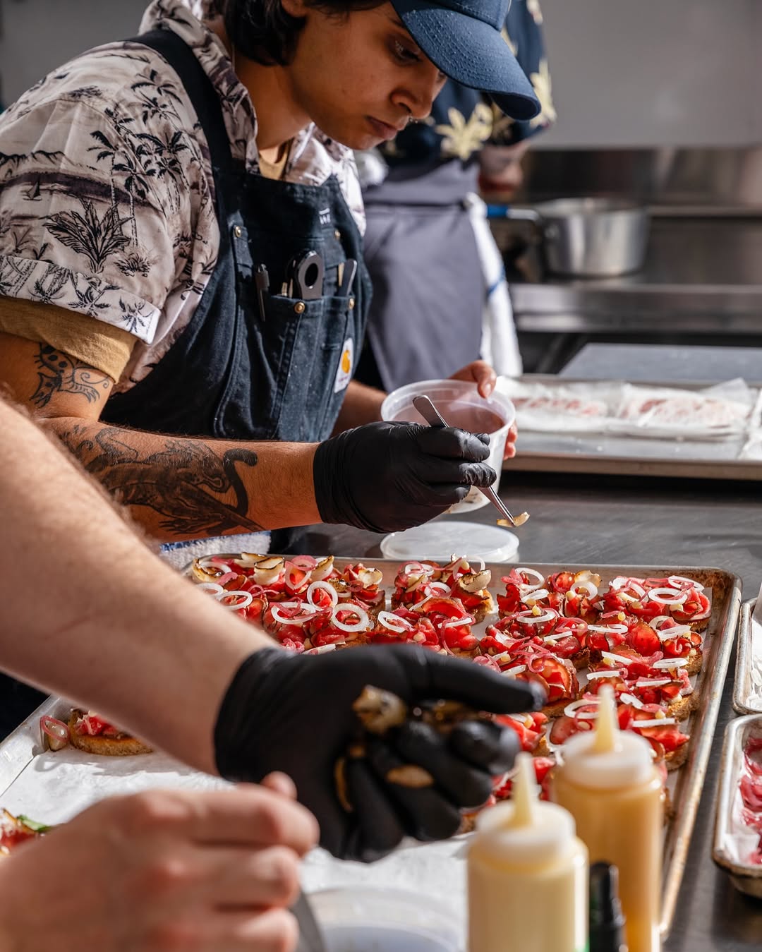 a group of people preparing food