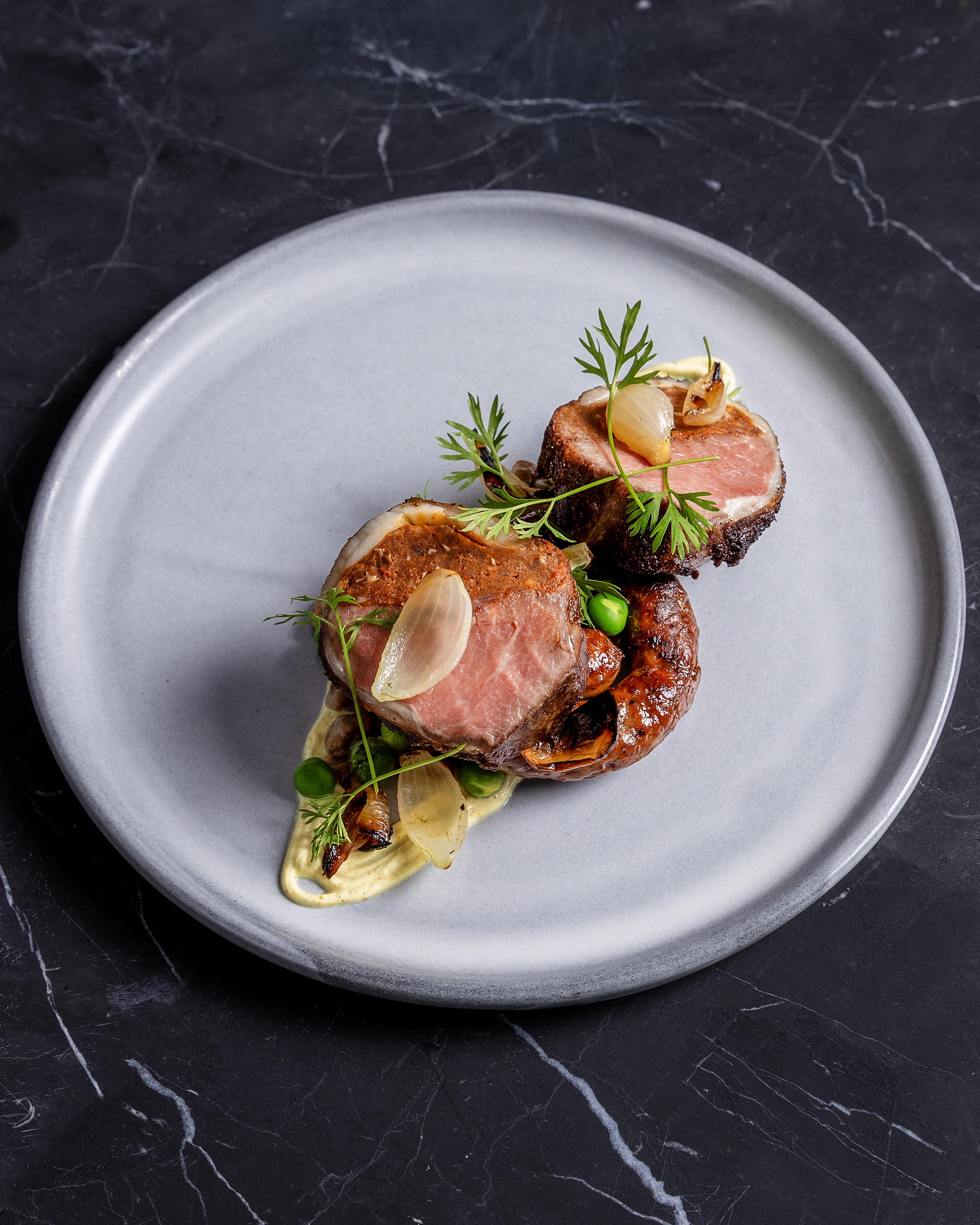 a plate of food on a marbled surface