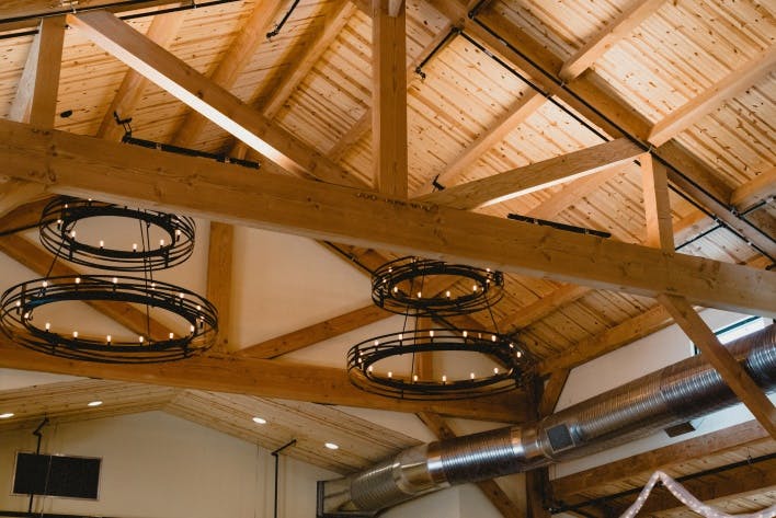 a clock hanging from the ceiling