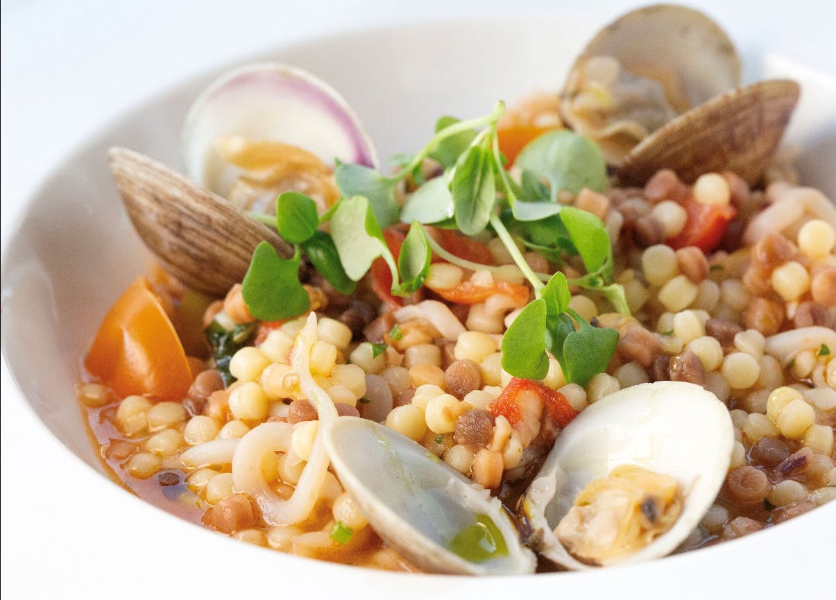 a dish is filled with different types of food on a plate