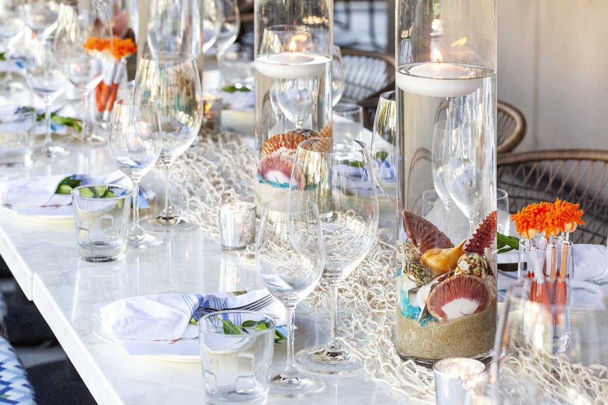 a dining table full of glasses