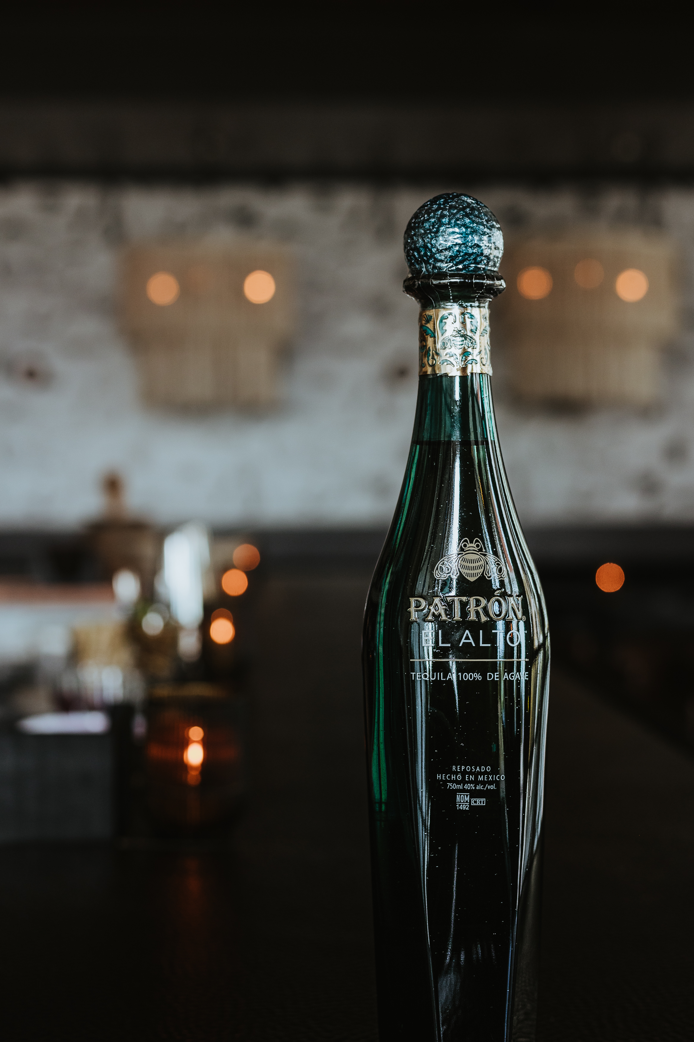 a glass bottle sitting on a table