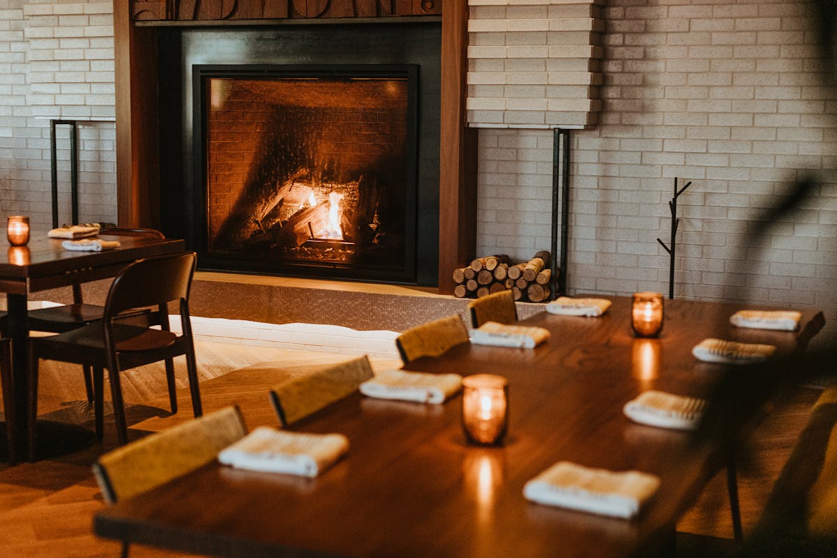 a living room filled with furniture and a fire place
