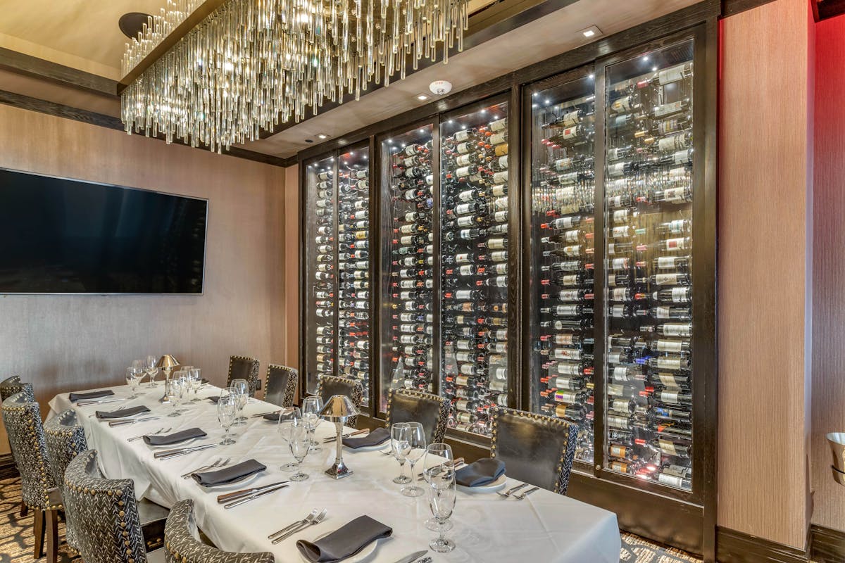 a dining room with a wine cellar