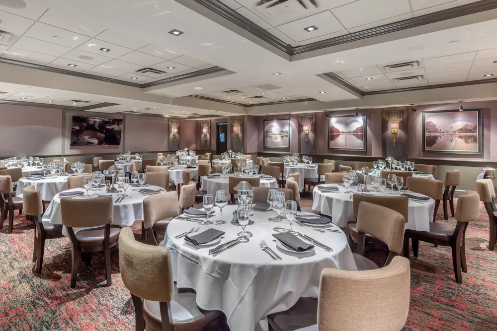 a large room with tables and chairs