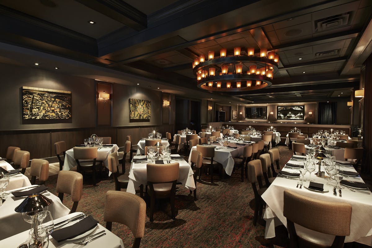 a room filled with furniture and a table in a restaurant