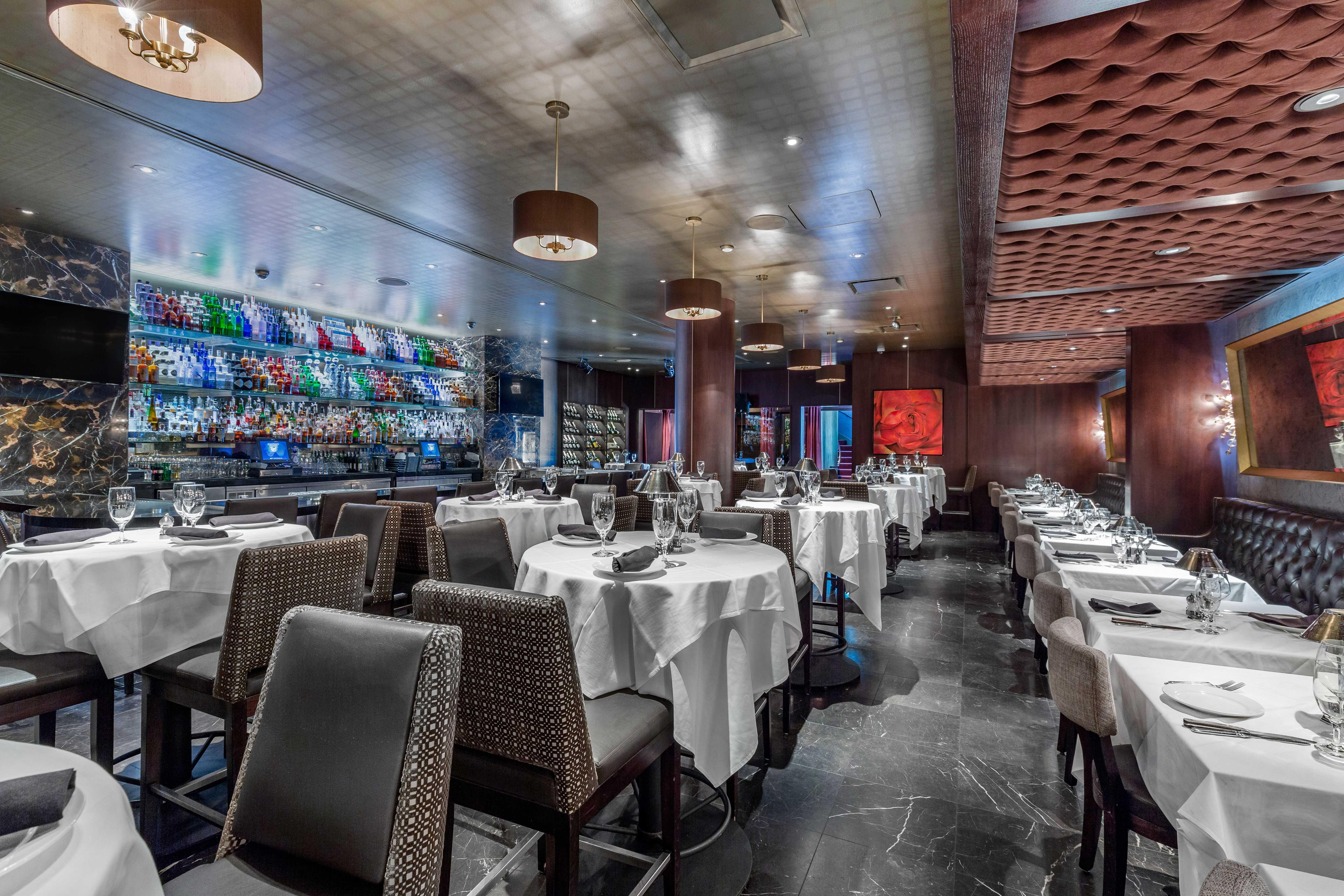 a restaurant with tables and chairs