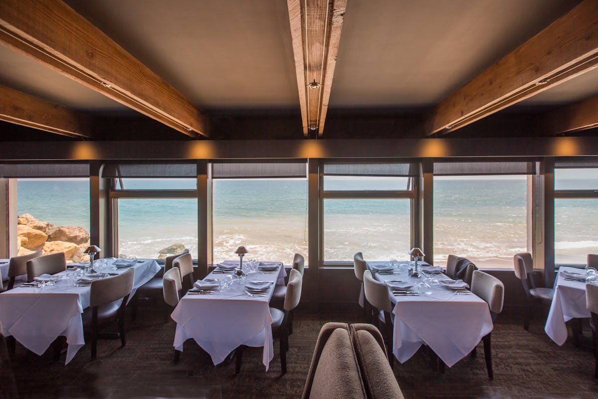 a dining room with ocean view