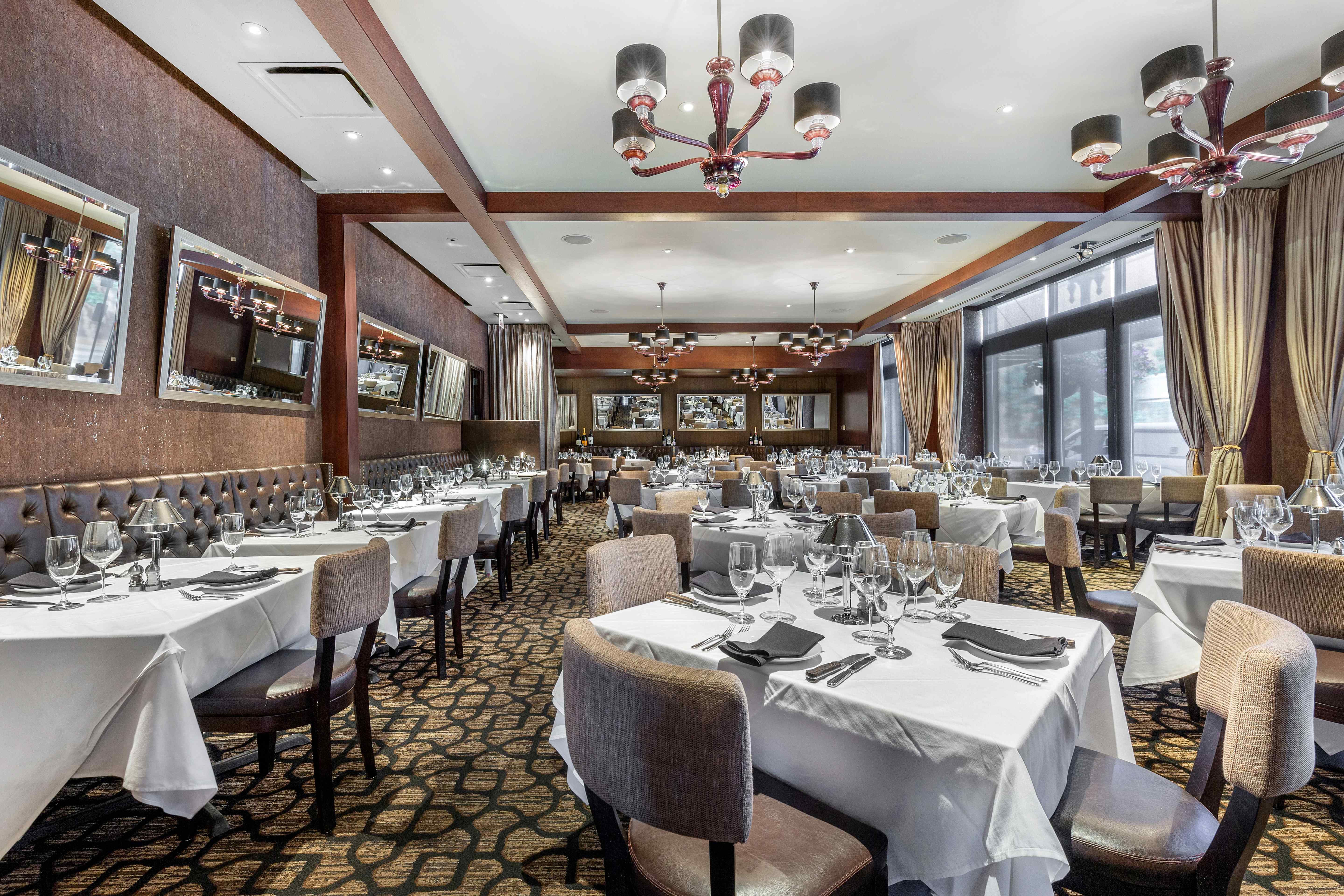 a room with tables and chairs