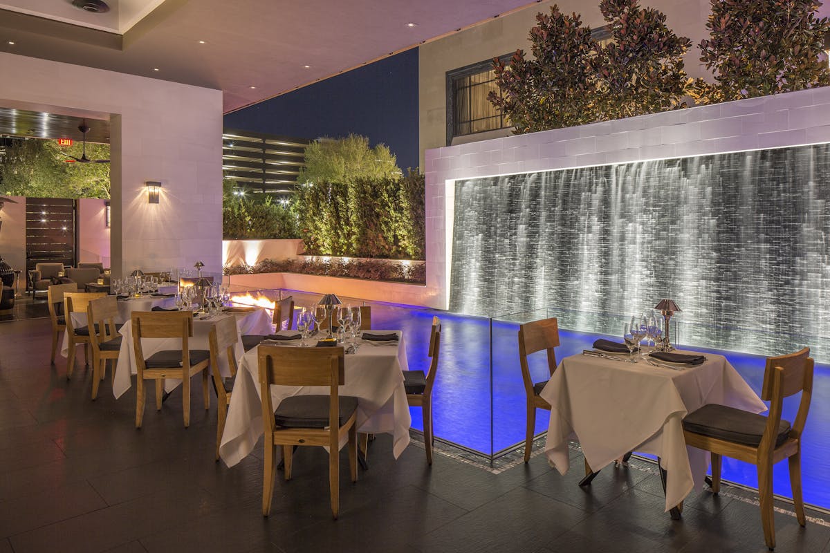 a dining room with a fountain