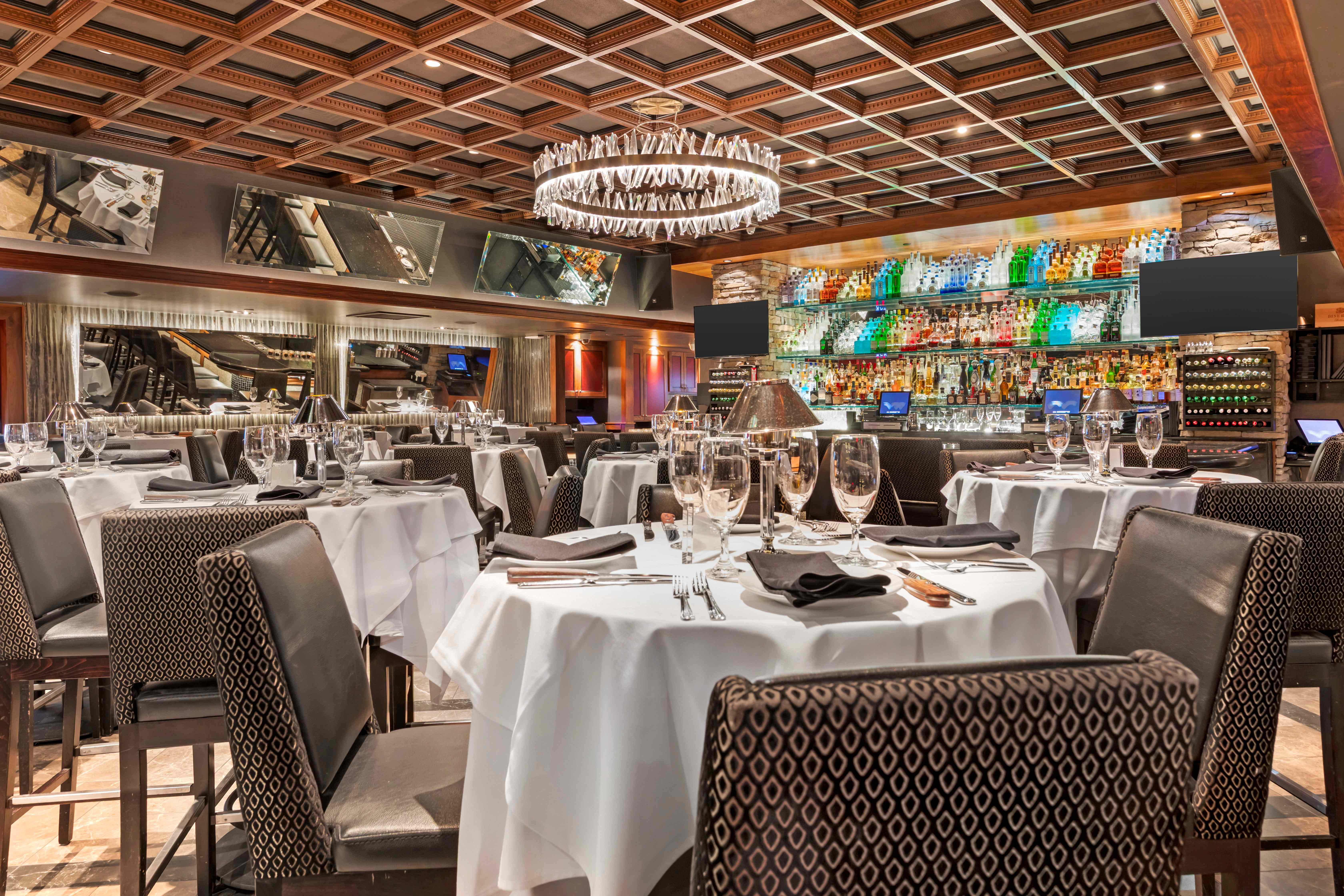 a restaurant with tables and chairs