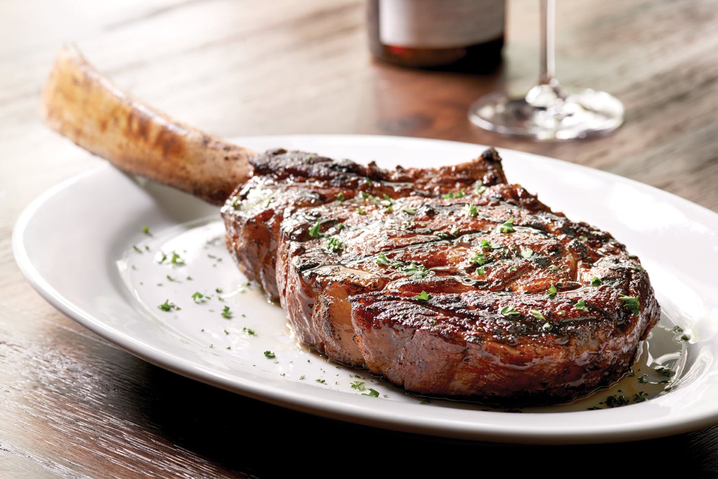 a piece of meat on a white plate
