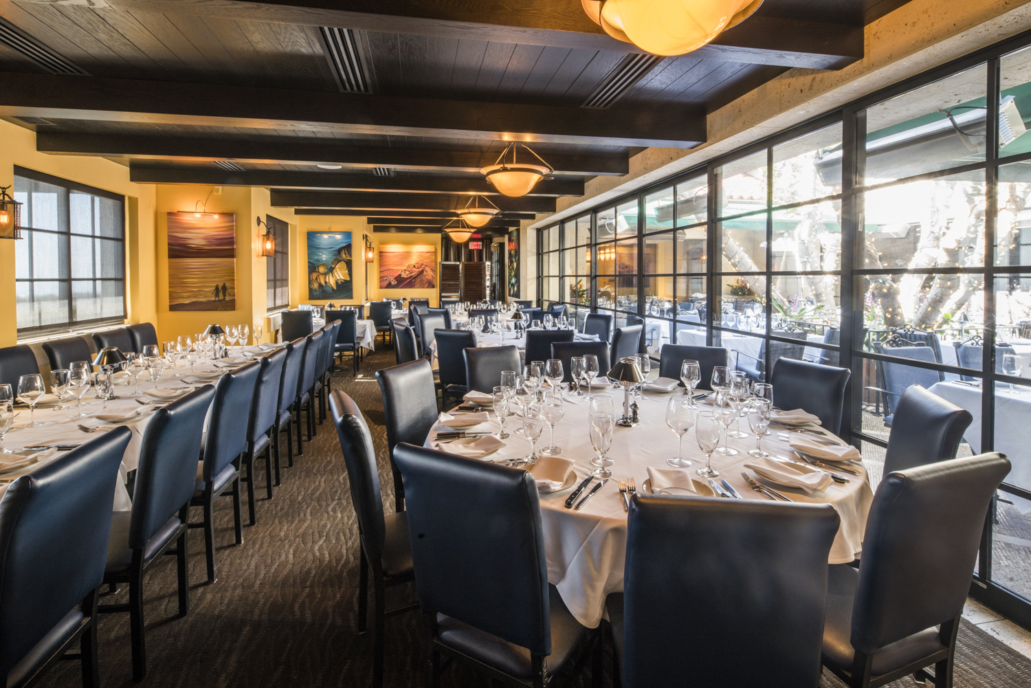 a room filled with furniture and a large window