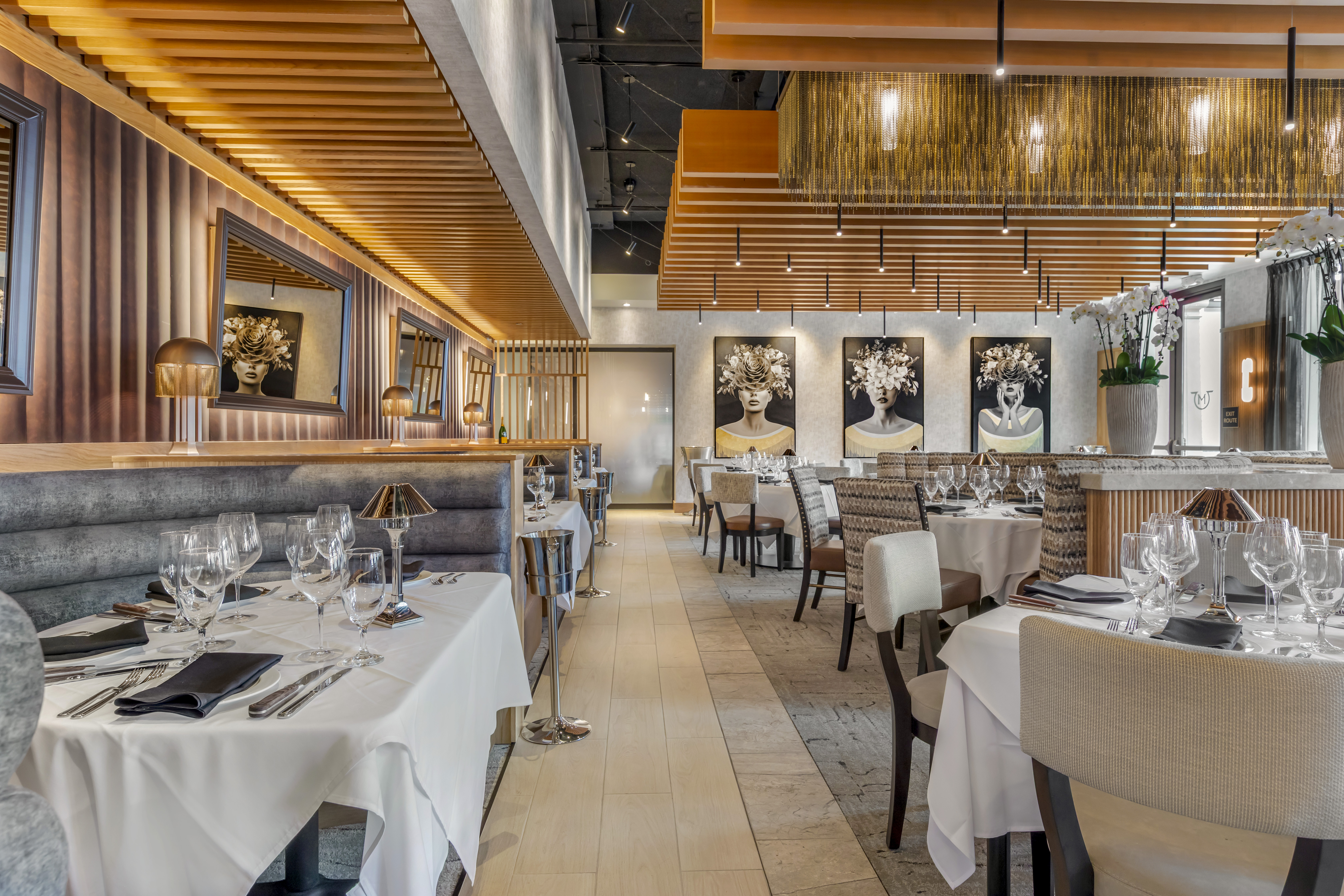 a group of palm trees on the side of a building