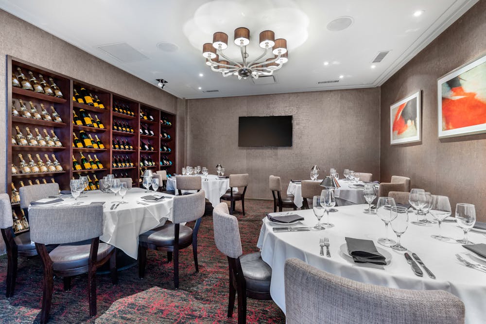 a room filled with furniture and a large window