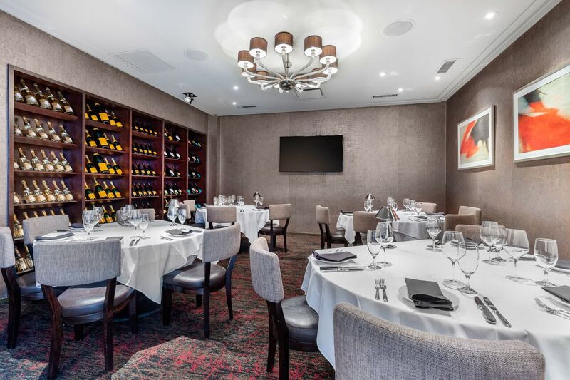 a room filled with furniture and a sink