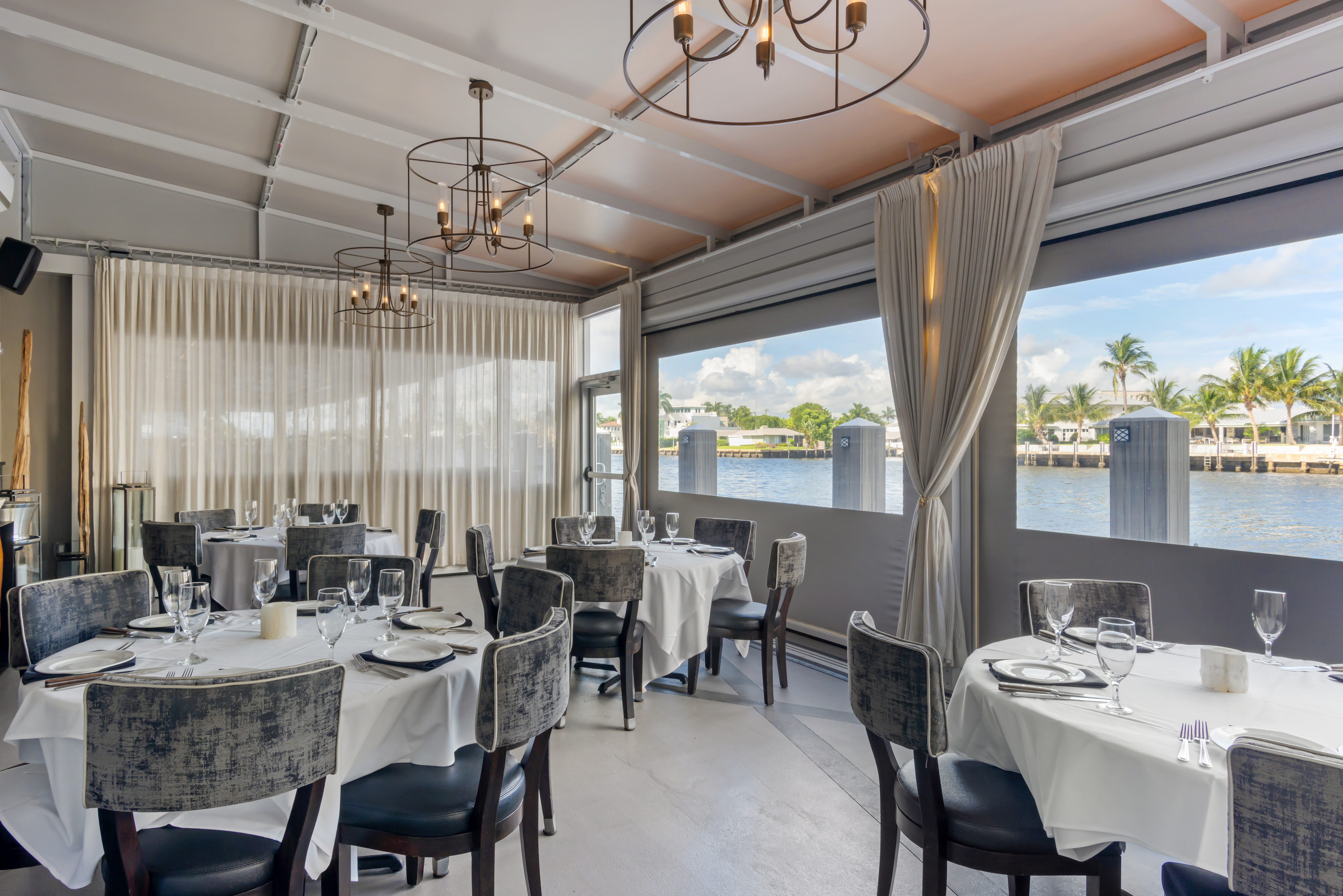 a large room with tables and chairs