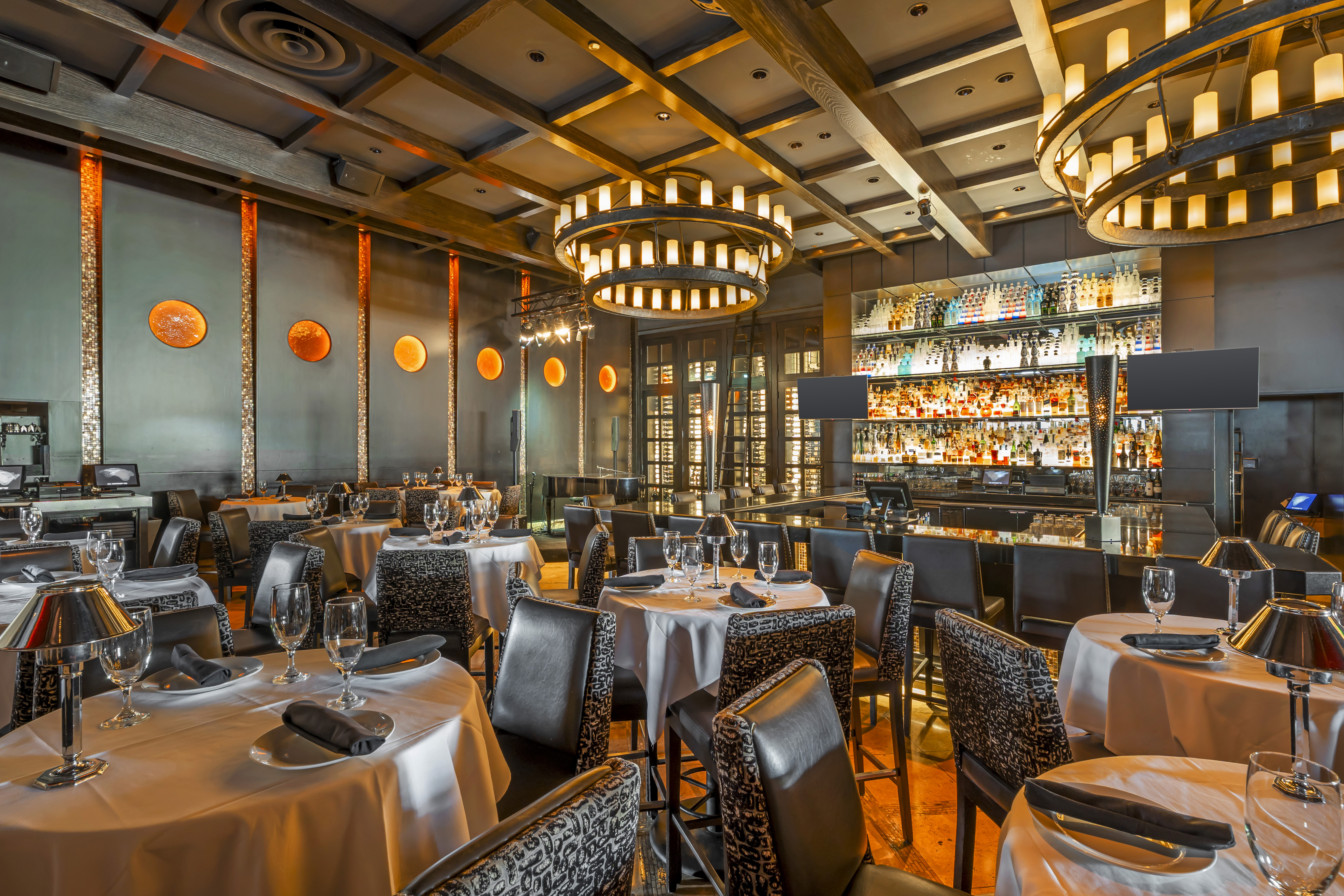 a restaurant with tables and chairs