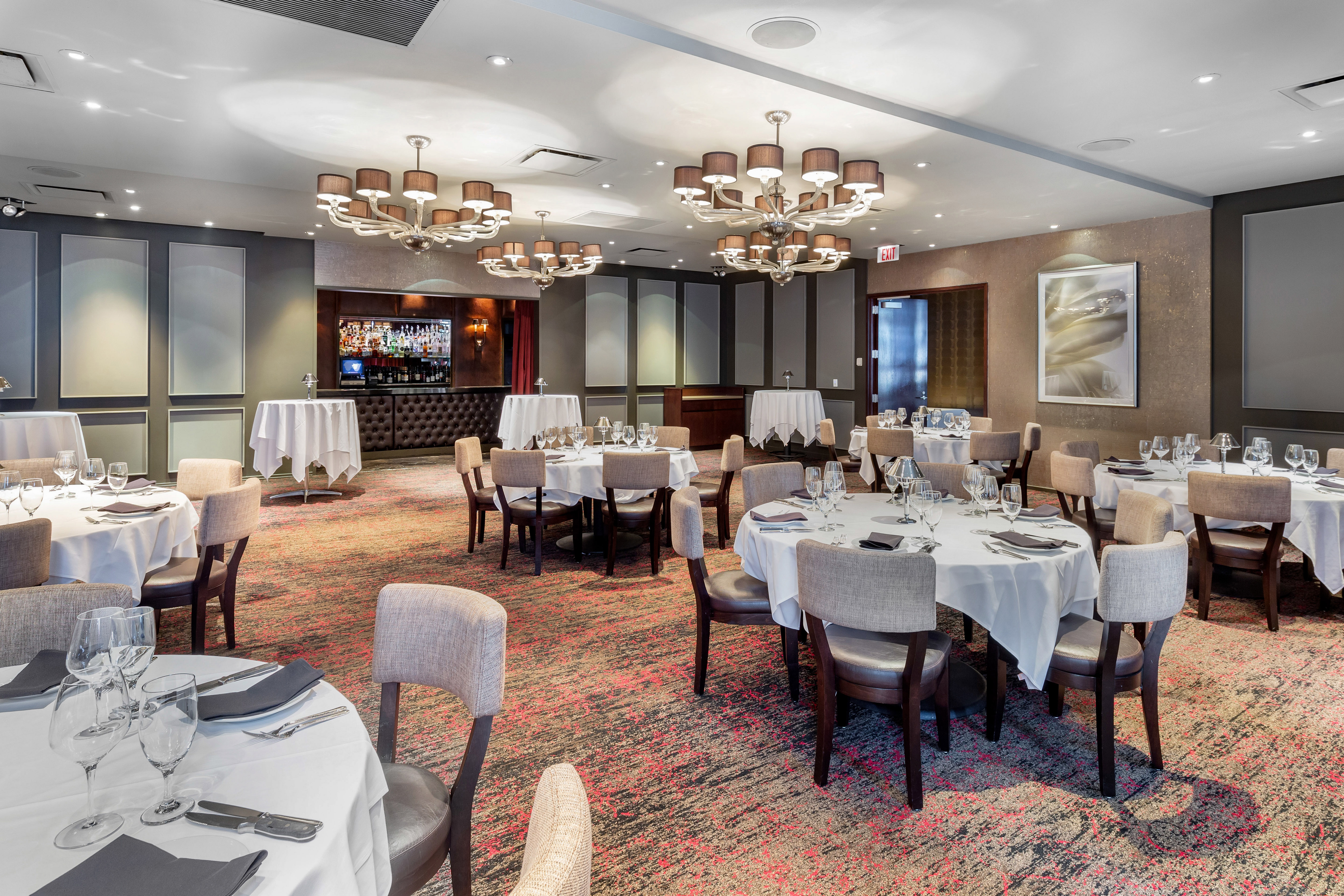 a living room filled with furniture and a large window